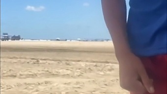 I Left The Young Guy To Play With My Tits On The Beach And He Also Played With Mine.